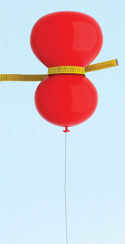 red balloon with measuring tape around the middle