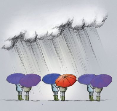 four people under umbrellas in the rain