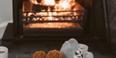 couple sitting by fireplace